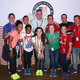 Steve Penny poses with members of the US Olympics gymnastics team (photo via Getty Images)